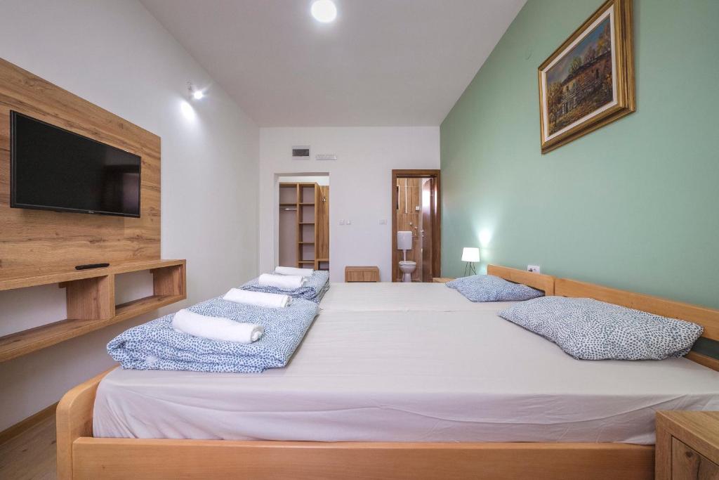 Postel nebo postele na pokoji v ubytování Zoe Pirot