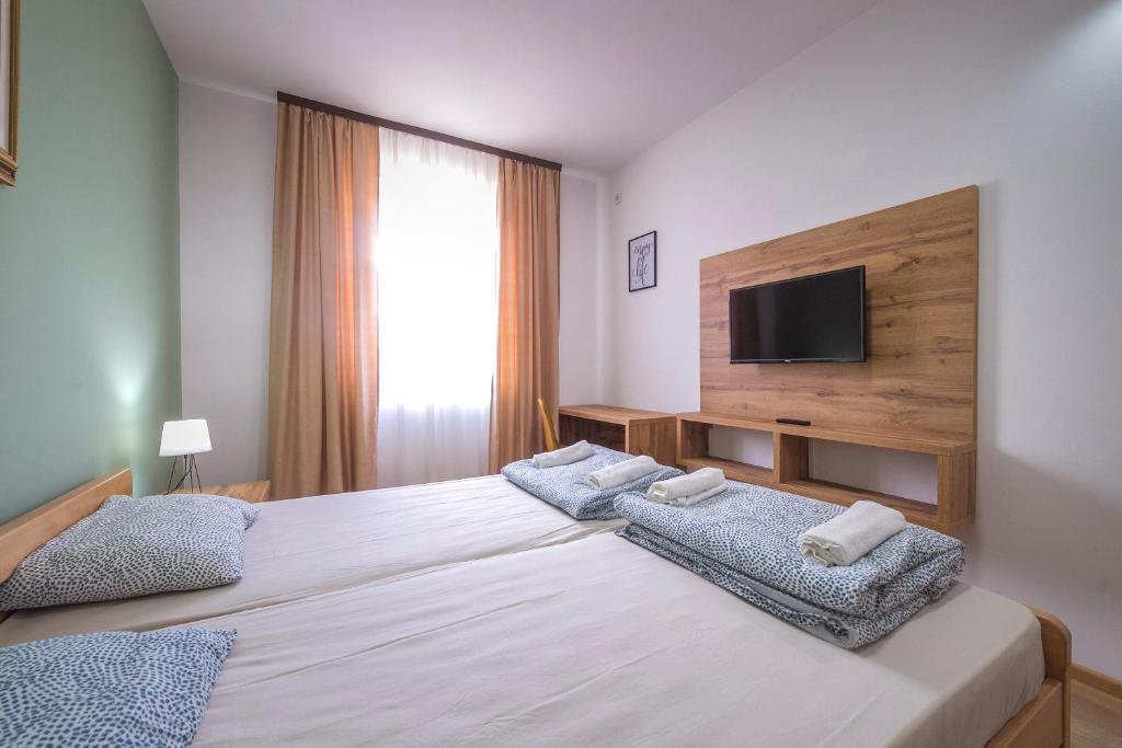 Postel nebo postele na pokoji v ubytování Zoe Pirot
