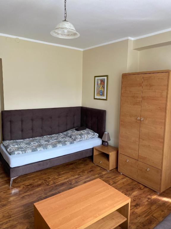Postel nebo postele na pokoji v ubytování Zajazd Kadar