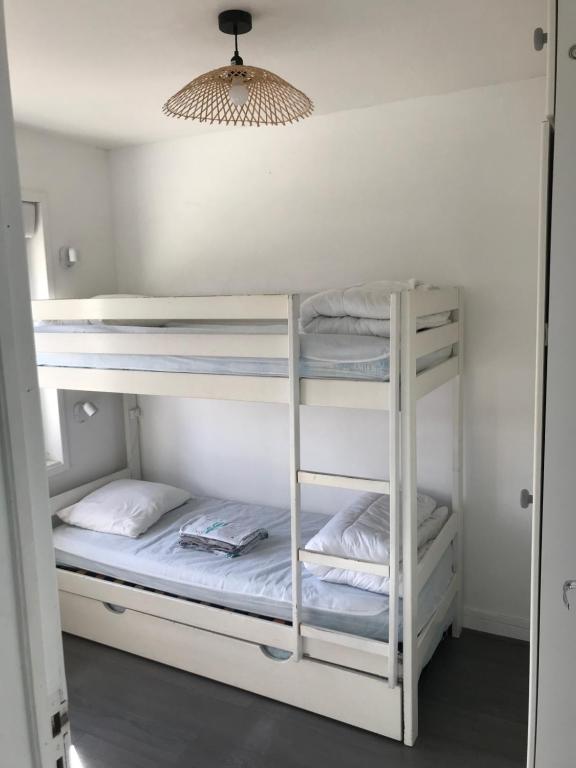 Postel nebo postele na pokoji v ubytování Ambleteuse appartement vue mer