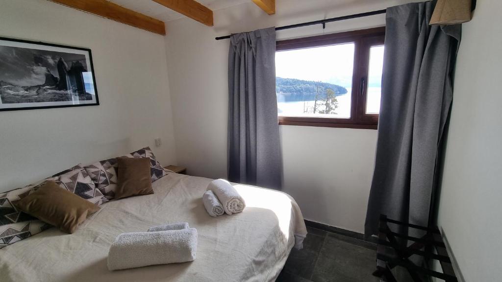 Postel nebo postele na pokoji v ubytování Hosteria Santa Rita