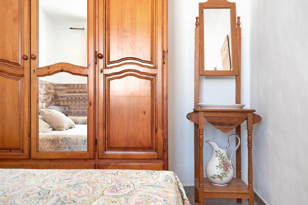 Postel nebo postele na pokoji v ubytování Casa Mari Loli 2
