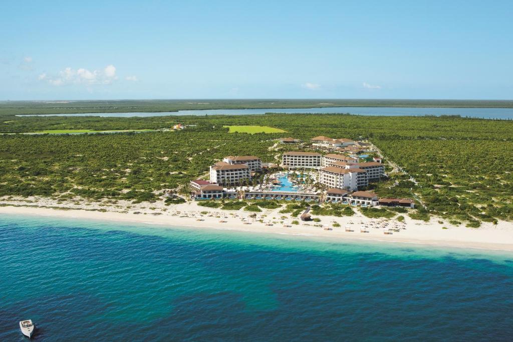 an aerial view of a resort on a beach at Secrets Playa Mujeres Golf & Spa Resort - All Inclusive Adults Only in Cancún