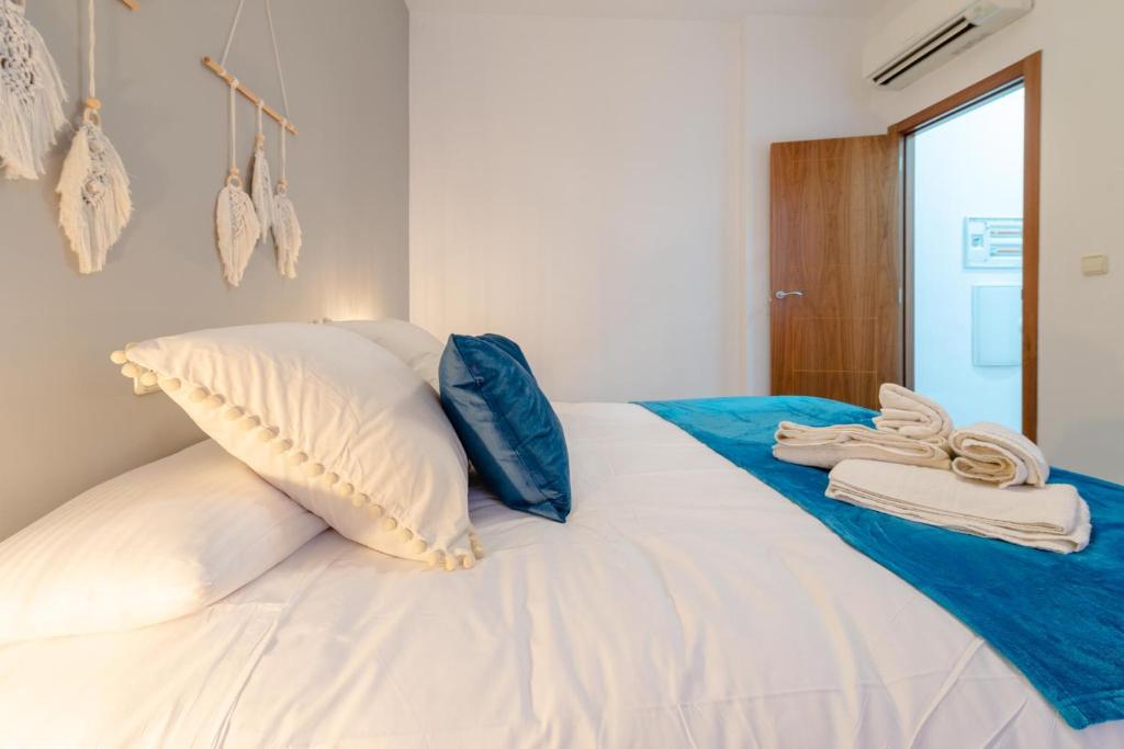 Posteľ alebo postele v izbe v ubytovaní Boutique Apartment Center Granada
