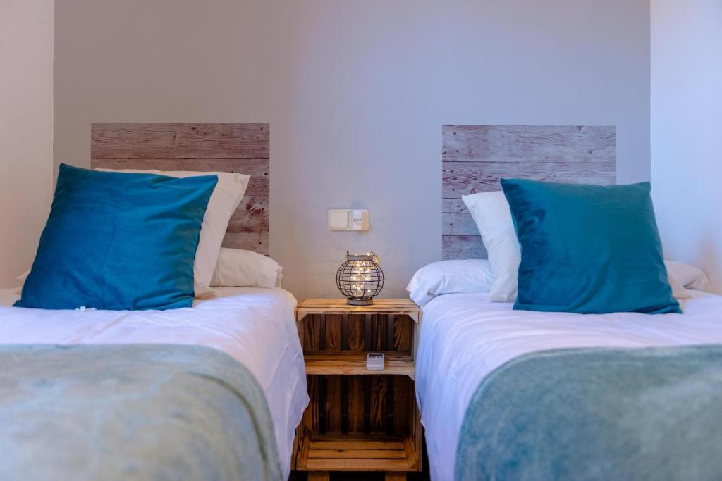 Posteľ alebo postele v izbe v ubytovaní Boutique Apartment Center Granada
