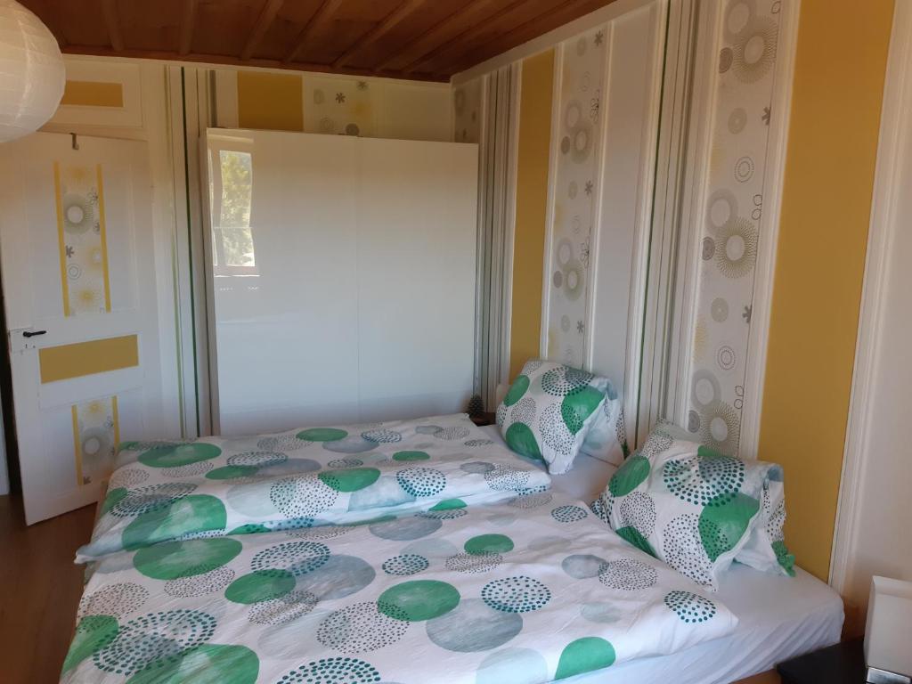 Postel nebo postele na pokoji v ubytování Ferme O'Clés