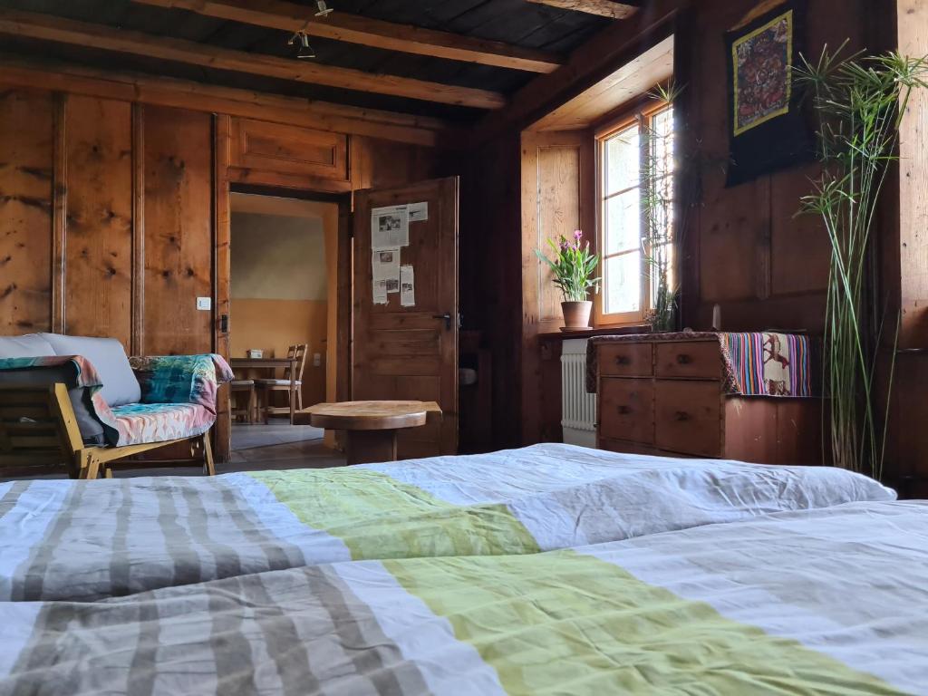 Postel nebo postele na pokoji v ubytování Ferme O'Clés