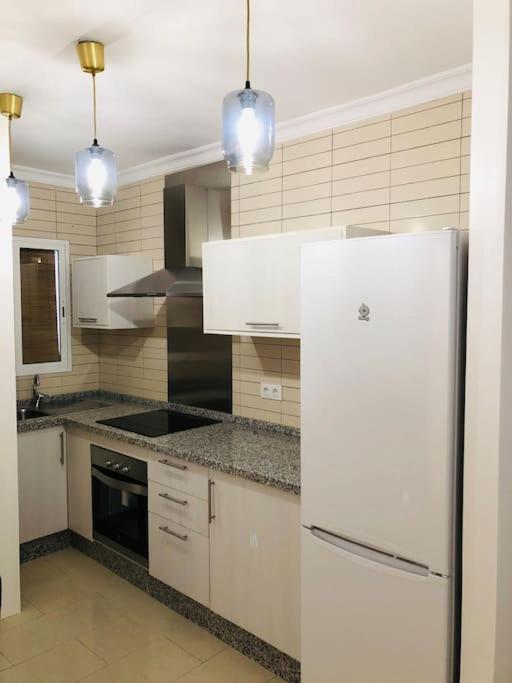 A kitchen or kitchenette at Nieves Viejas Apartamento Fresco con patio en Córdoba