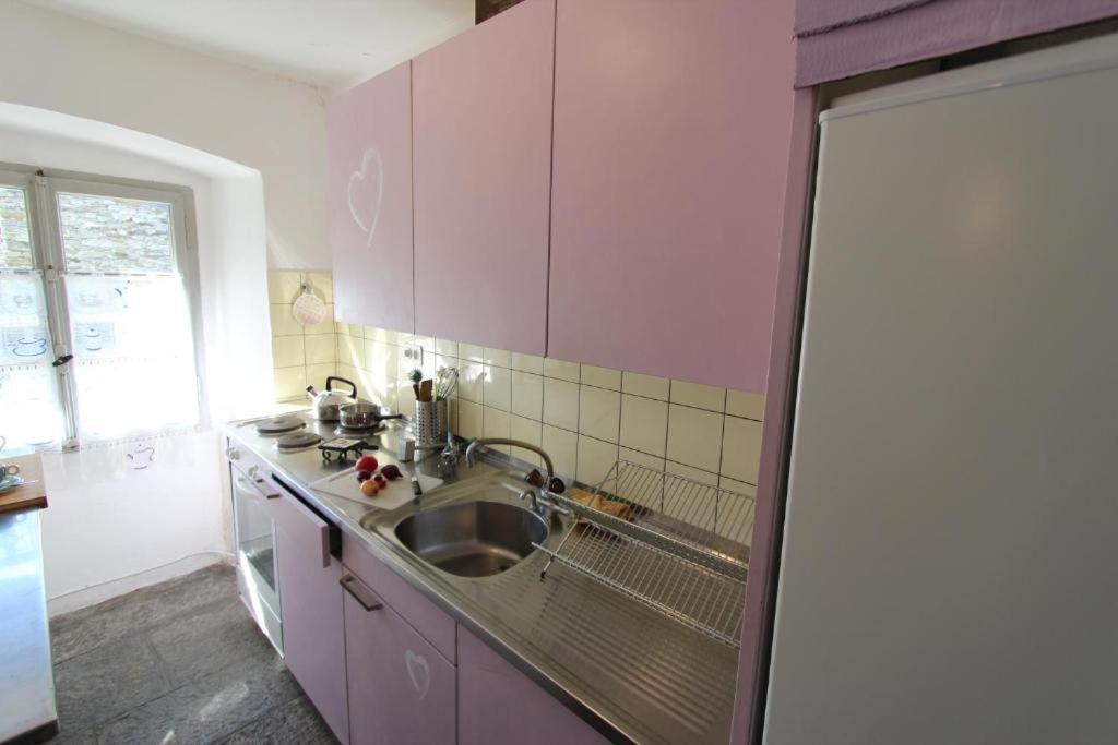 Kuchyň nebo kuchyňský kout v ubytování Camera in Casa Eva