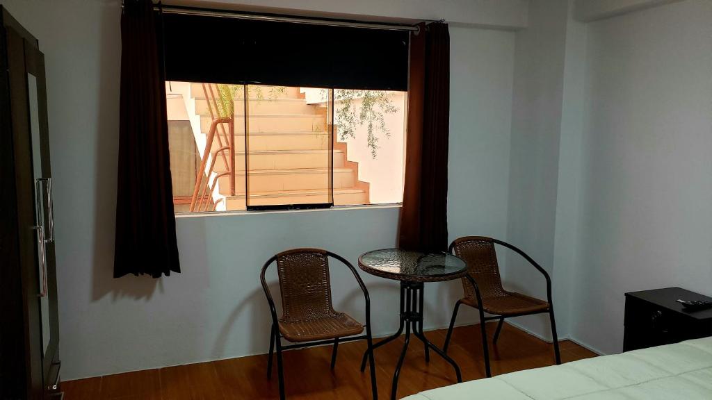 Hostal Cusco de mis Sueños客房内的一张或多张床位