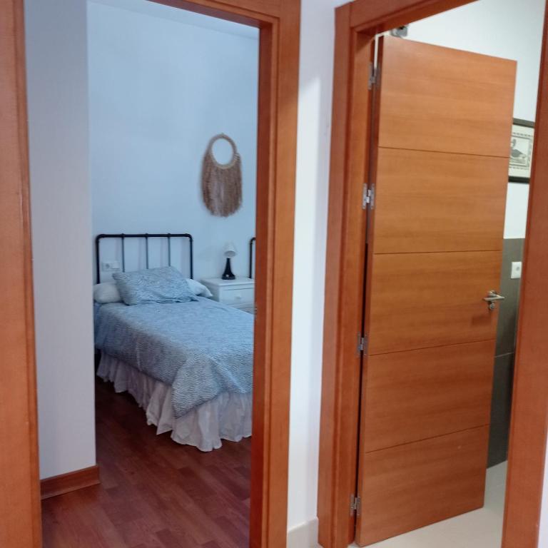 Postel nebo postele na pokoji v ubytování Casa San Isidro