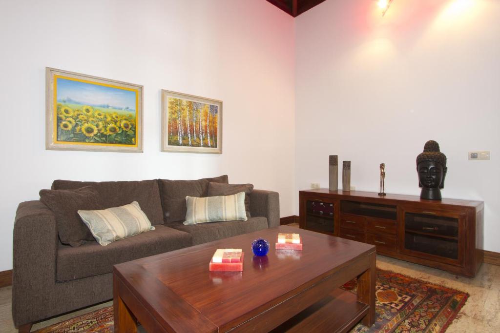 a living room with a couch and a coffee table at Villa Remedios in Teguise