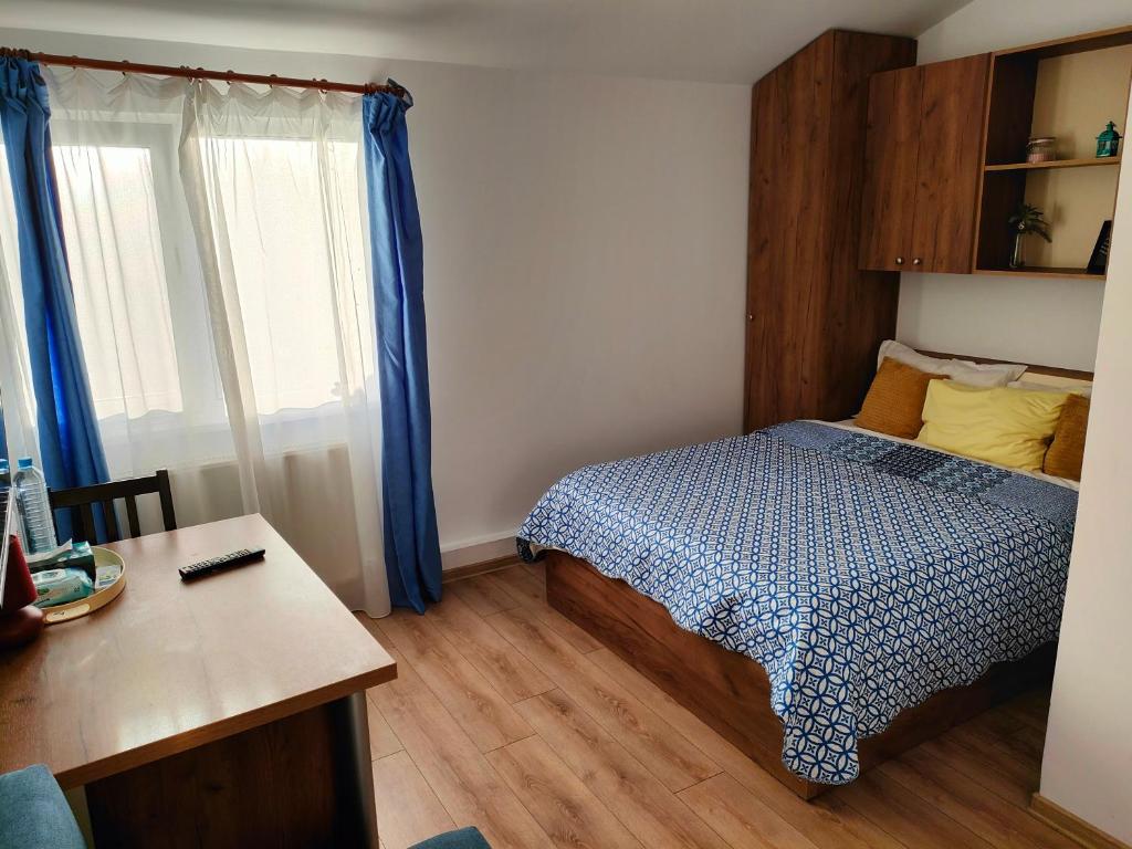 Postel nebo postele na pokoji v ubytování iVAVev Is Us byTheSea Constanta