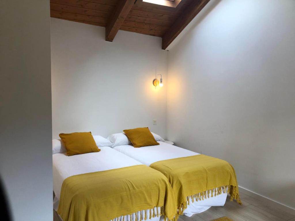 Ένα ή περισσότερα κρεβάτια σε δωμάτιο στο Casita Pelopin