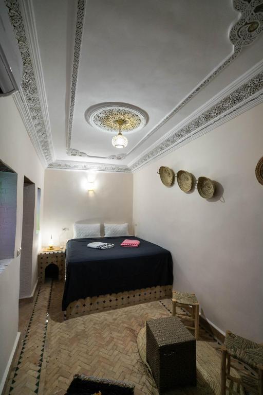 Postel nebo postele na pokoji v ubytování Riad Fes Unique