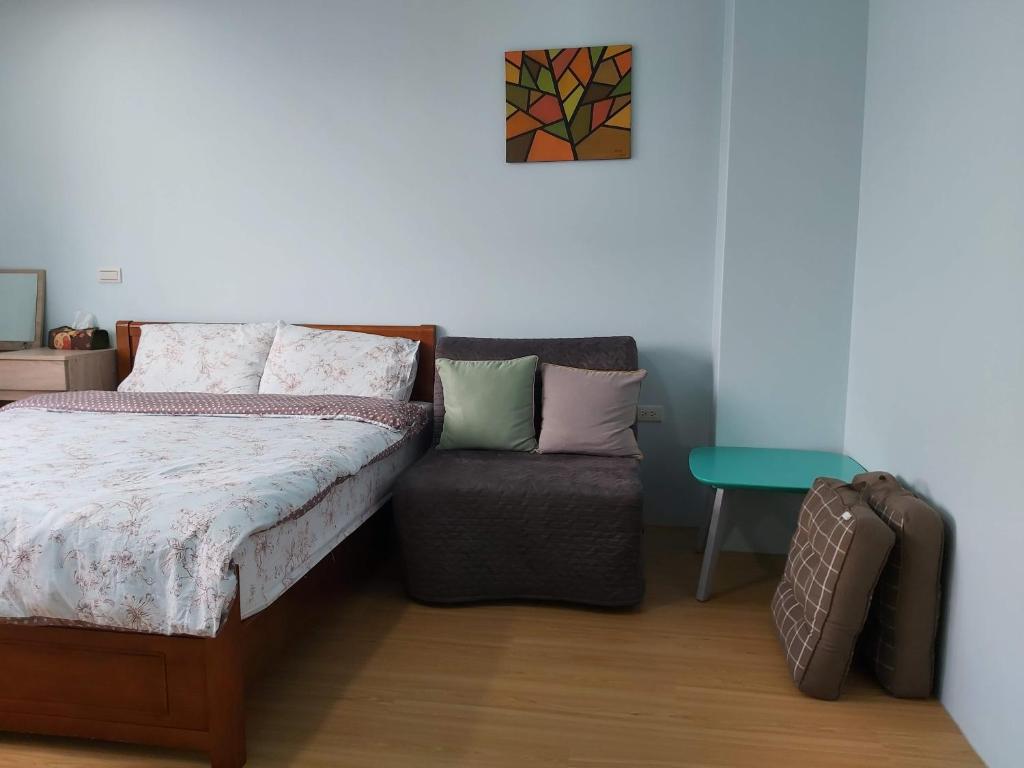 Postel nebo postele na pokoji v ubytování Chin-Lan B&B