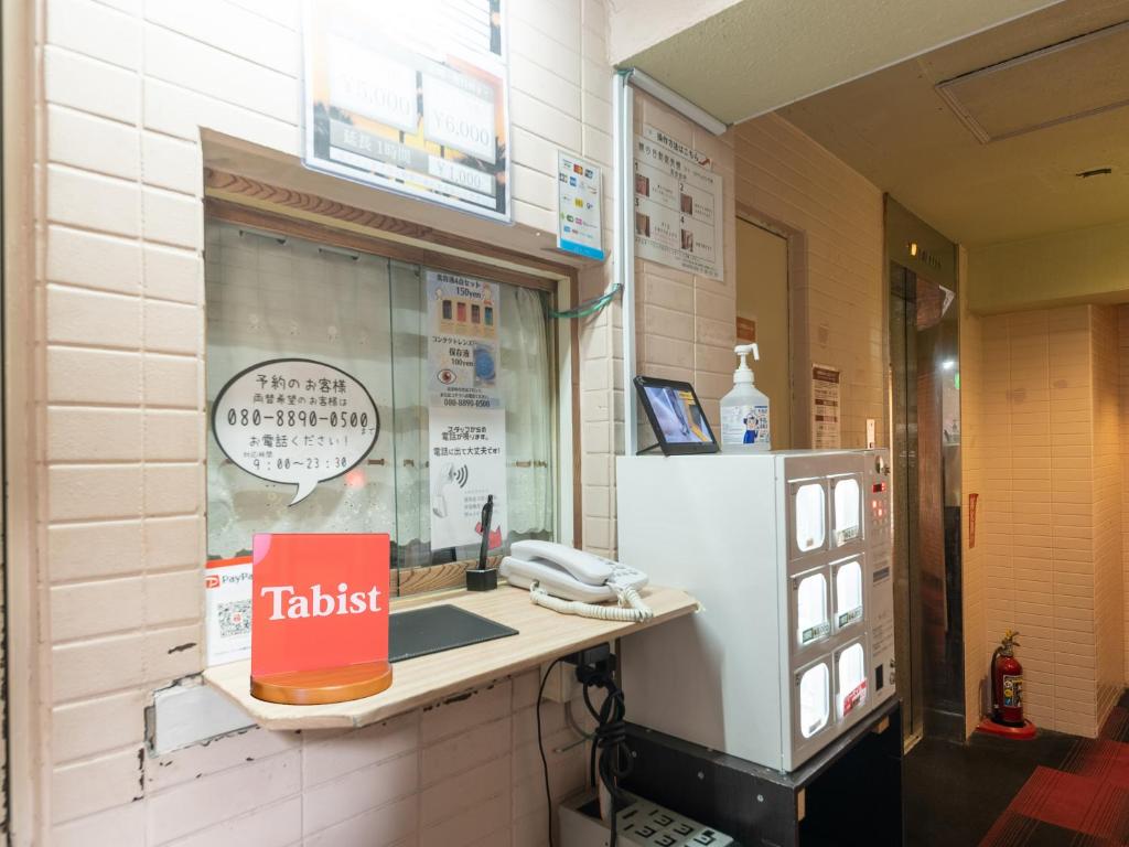 Kuchyň nebo kuchyňský kout v ubytování Tabist Hotel Florida Ikebukuro