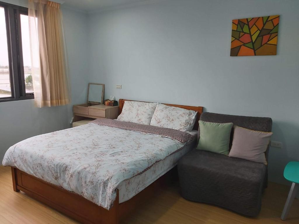 Postel nebo postele na pokoji v ubytování Chin-Lan B&B
