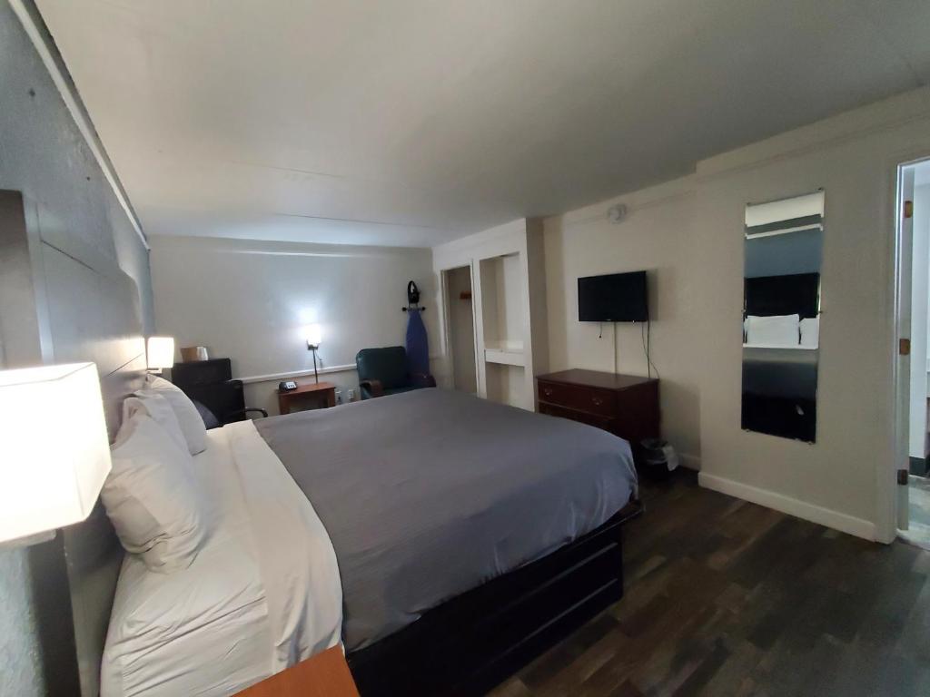 Relax Inn West Medical Center - King Room - Acceso A La Discapacidad