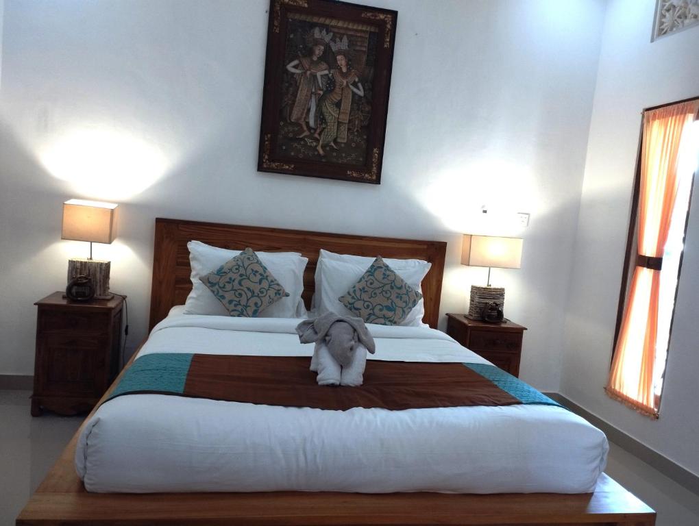 Postel nebo postele na pokoji v ubytování Bupala Guest House