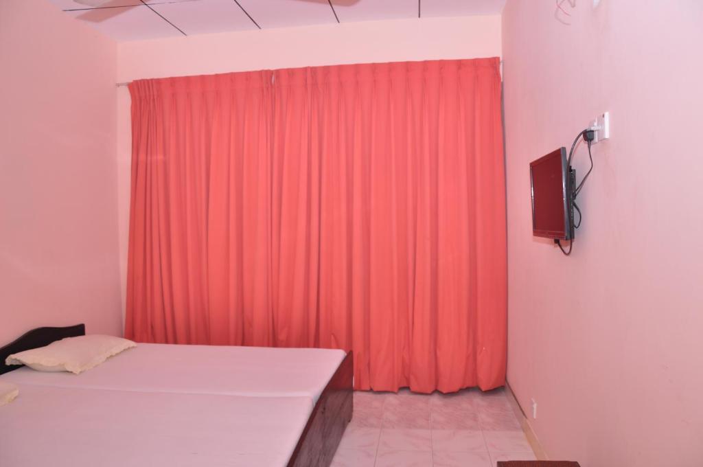 TV a/nebo společenská místnost v ubytování Mount Crest Inn Deniyaya