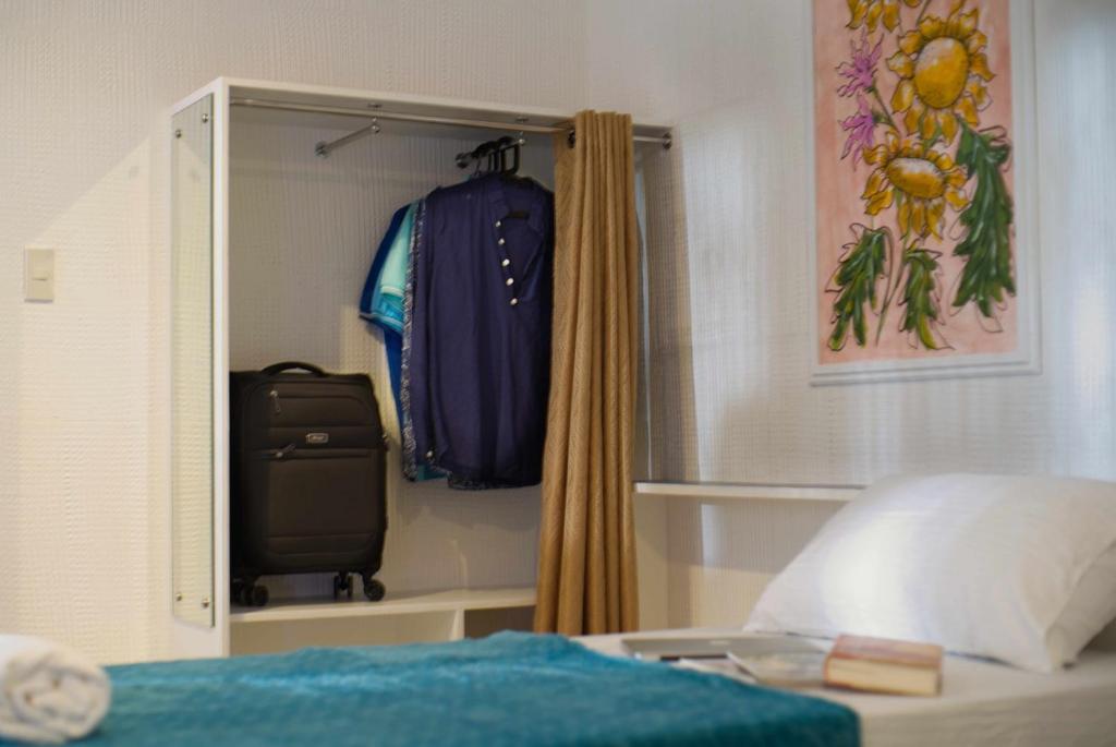 Postel nebo postele na pokoji v ubytování 1001 Nights Boutique Inn