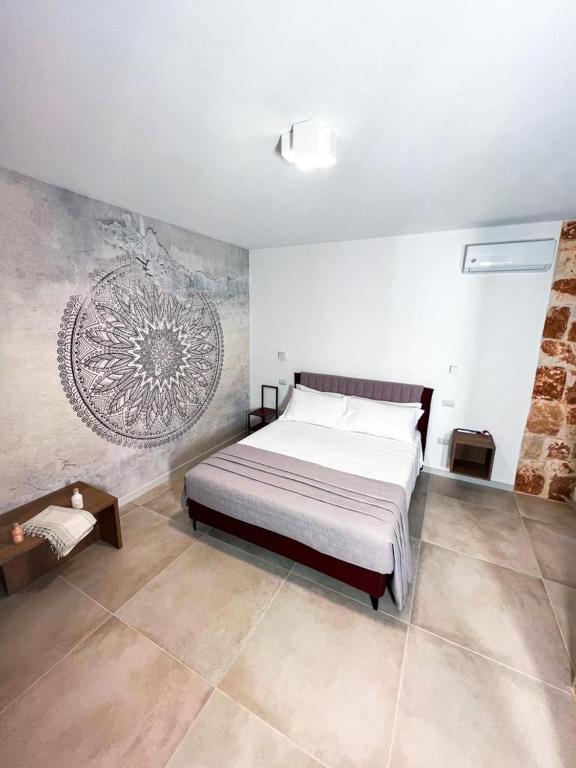 Postel nebo postele na pokoji v ubytování Olea Relais