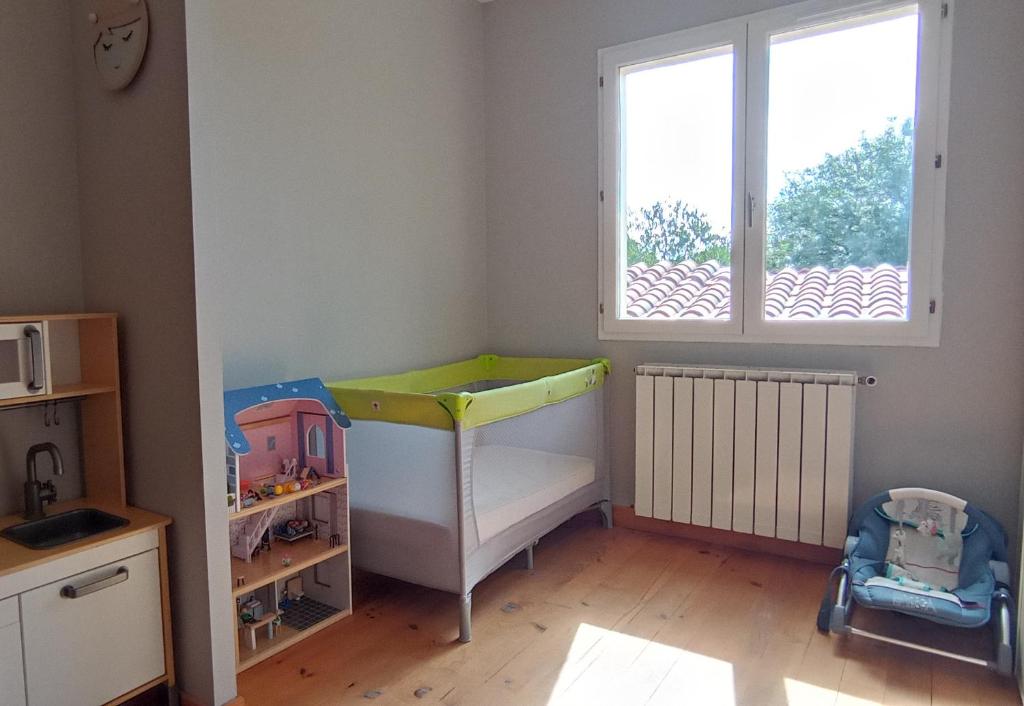 Posteľ alebo postele v izbe v ubytovaní Maison tout confort avec piscine