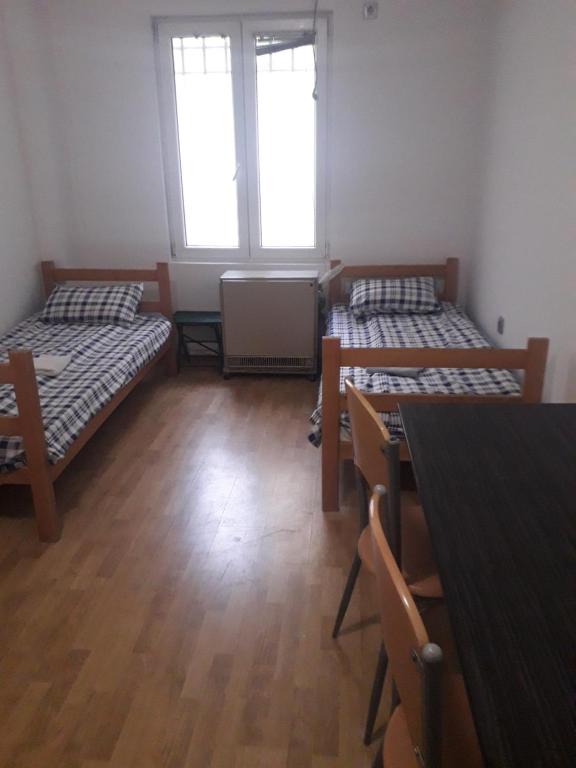 Postel nebo postele na pokoji v ubytování Jasmin