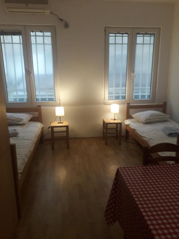 Postel nebo postele na pokoji v ubytování Jasmin