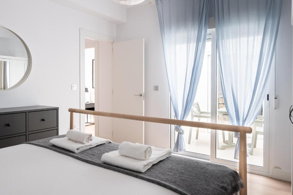 Postel nebo postele na pokoji v ubytování Casa señorial en el corazón del Puerto by Hometels