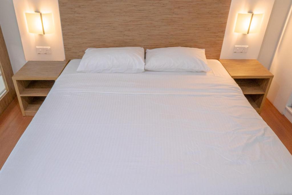 Postel nebo postele na pokoji v ubytování The CEO Executive Suites