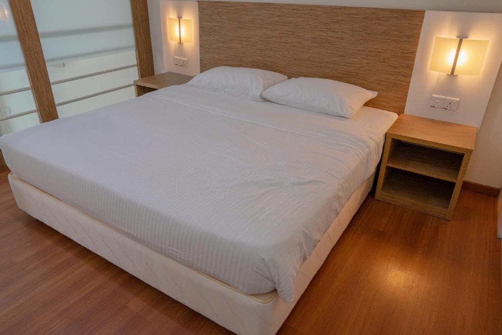 Postel nebo postele na pokoji v ubytování The CEO Executive Suites