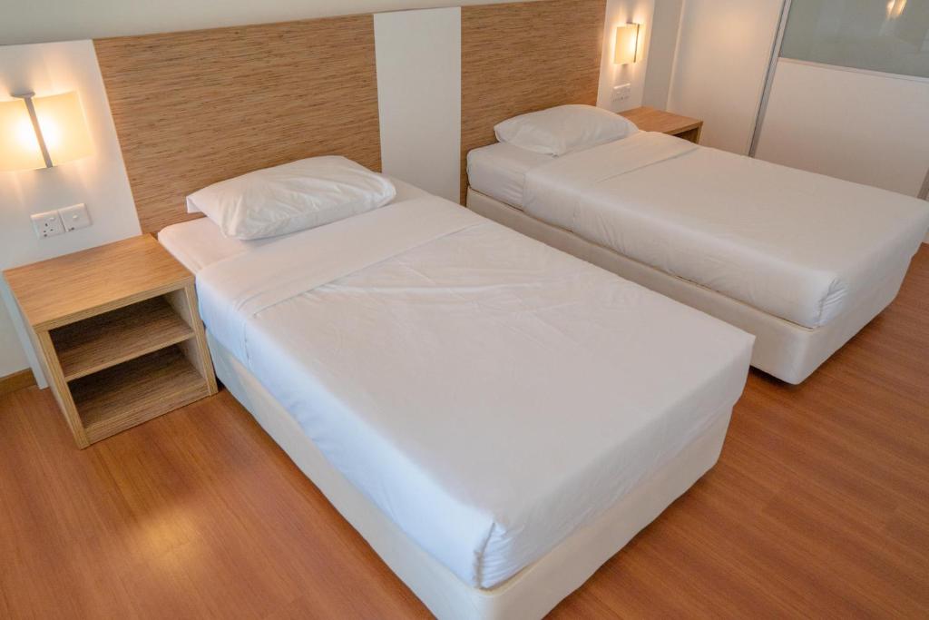 Postel nebo postele na pokoji v ubytování The CEO Executive Suites