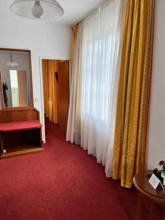 Postel nebo postele na pokoji v ubytování Hotel Seeperle