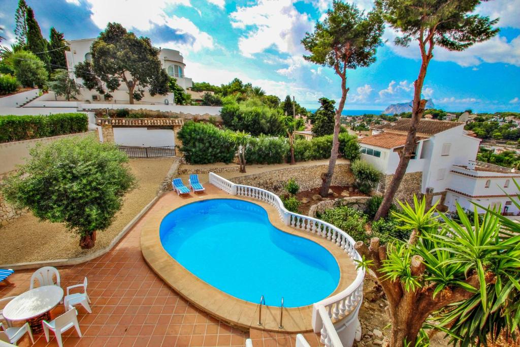 Bazén v ubytovaní Blanca - vacation villa with panoramic sea views and private pool in Benissa alebo v jeho blízkosti