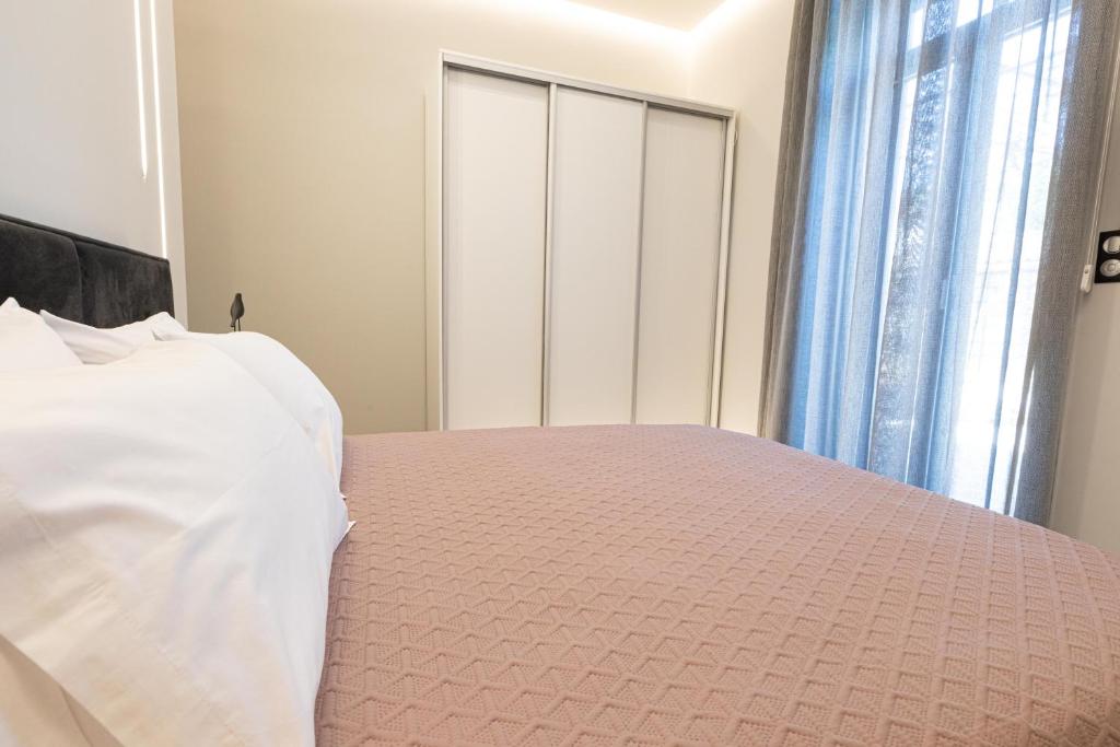 Postel nebo postele na pokoji v ubytování BillMar Luxury Apartment in the center of Gythio