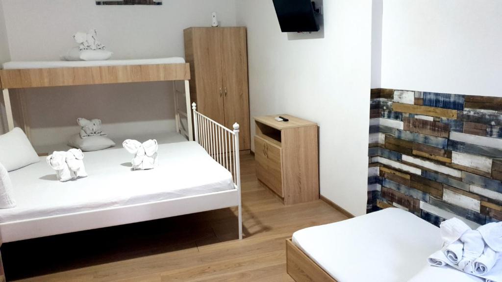 Postel nebo postele na pokoji v ubytování Casa Nicholas