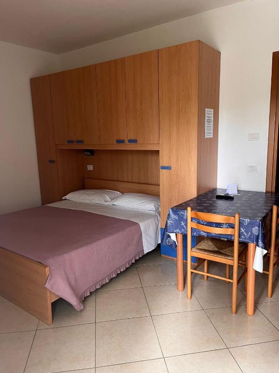 Postel nebo postele na pokoji v ubytování Il Tombolo