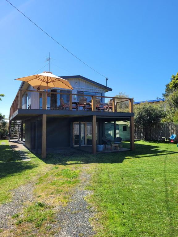 a house with an umbrella on top of it at 4 Bounty in Corinella