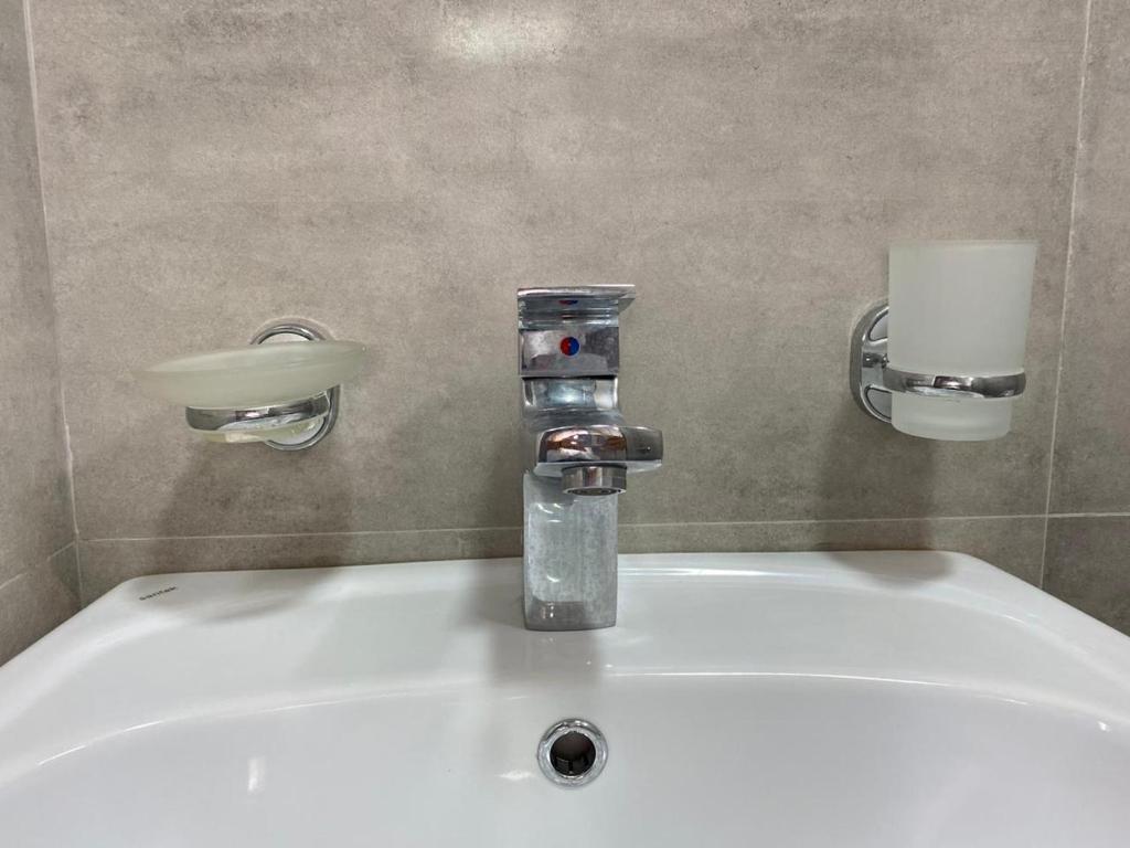Koupelna v ubytování nira hotel
