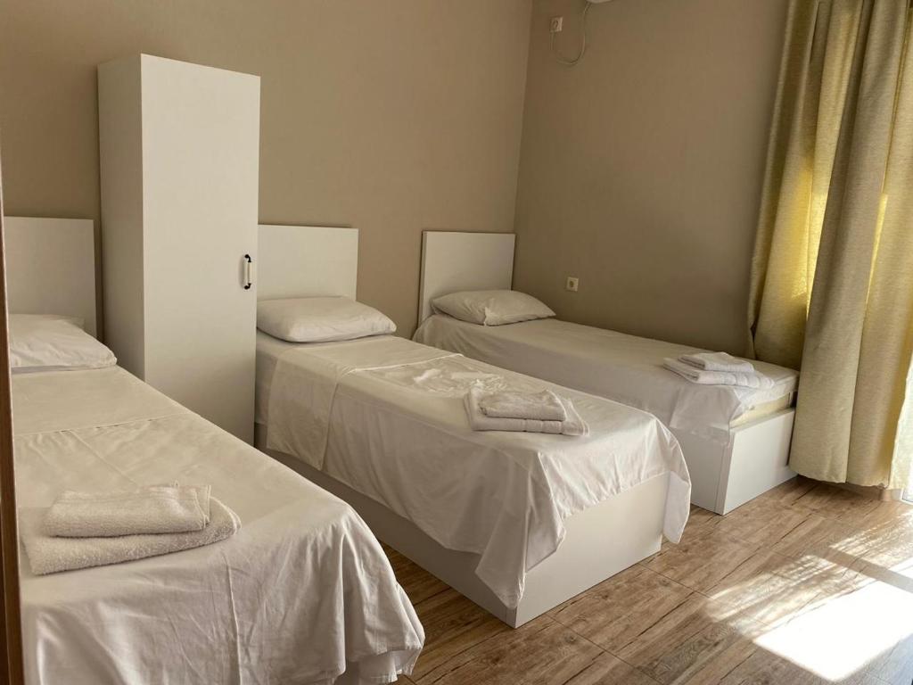 Postel nebo postele na pokoji v ubytování nira hotel