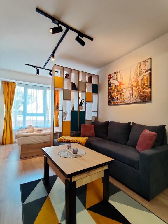 Posezení v ubytování Cozy Studio near the Historical Heart of Sofia by Flat Mаnager