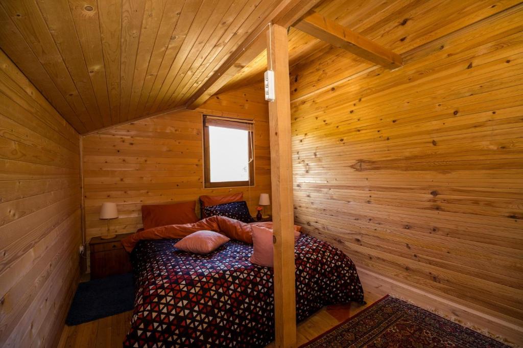 Postel nebo postele na pokoji v ubytování Рибарник Forest Мagic