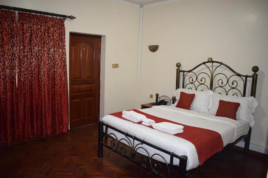 Postel nebo postele na pokoji v ubytování Sochati Casa Resort