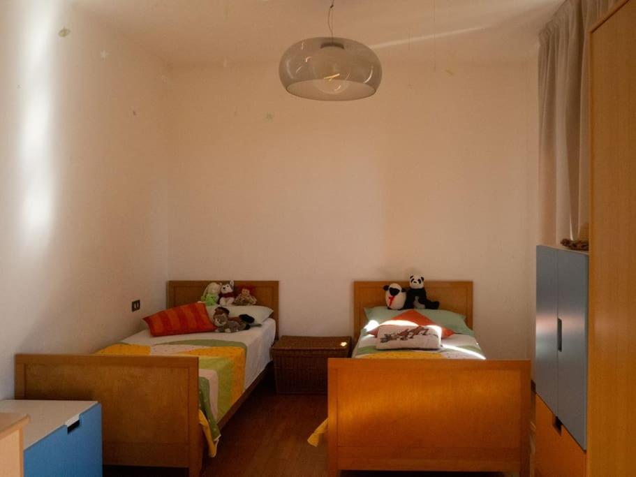 Posteľ alebo postele v izbe v ubytovaní La tua villa sul Lago - Casa Kollegger