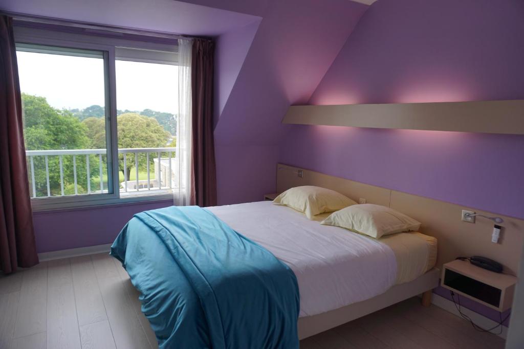 Postel nebo postele na pokoji v ubytování Hotel Ker Vennaik