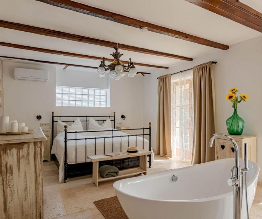 Postel nebo postele na pokoji v ubytování Casa Elisabetta Apartmanház