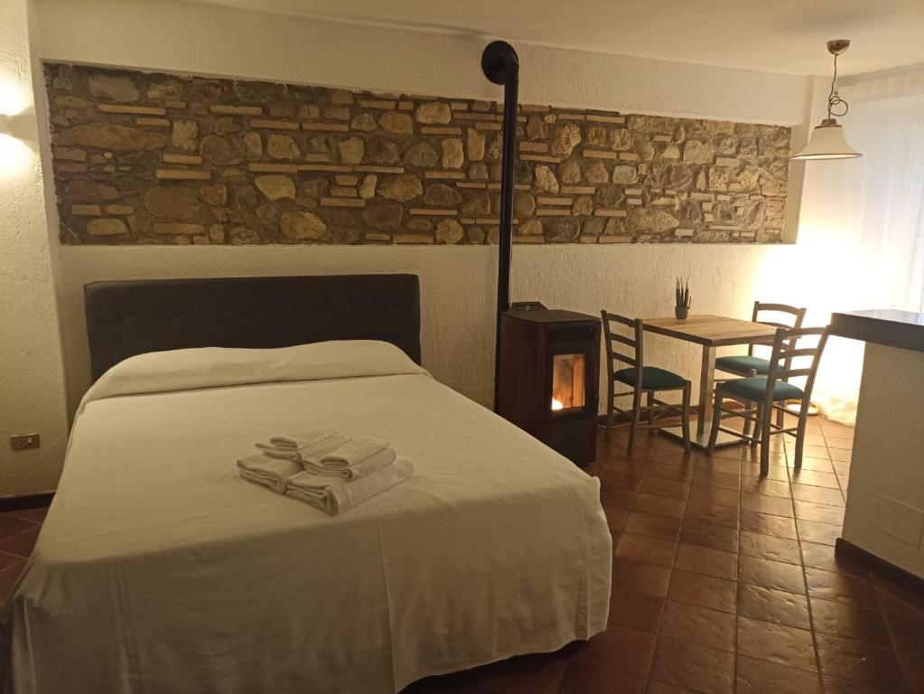 A bed or beds in a room at Gabriele Country House