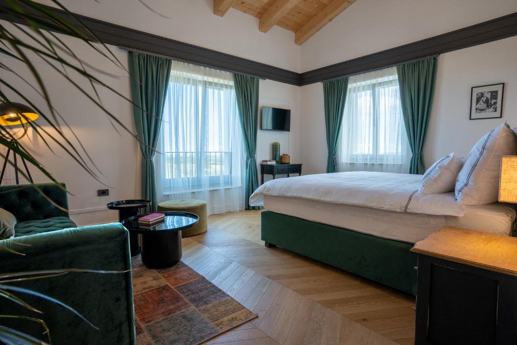 Łóżko lub łóżka w pokoju w obiekcie Restaurant & Villa Morgan